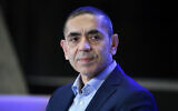 Ugur Sahin, co-founder of the Mainz-based coronavirus vaccine developer BioNTech, listens during an Axel Springer Award ceremony, March 18, 2021.(Bernd von Jutrczenka/dpa via AP, Pool)