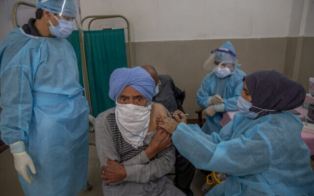 A Kashmiri man receives the COVISHIELD vaccine for COVID-19 at a primary health center in Srinagar, Indian controlled Kashmir, April 28, 2021 (AP Photo/ Dar Yasin) A Kashmiri man receives the COVISHIELD vaccine for COVID-19 at a primary health center in Srinagar, Indian controlled Kashmir, April 28, 2021 (AP Photo/ Dar Yasin)