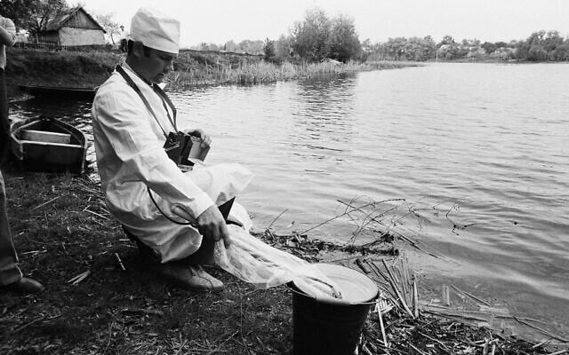 A Soviet technician checks water taken from a stream near Kiev for radiation on  May 9, 1986. Checks are being performed hourly to be certain water supplies are safe to use in the wake of the Chernobyl nuclear plant accident that occurred on Friday.  (AP Photo/Boris Yurchenko/pool)