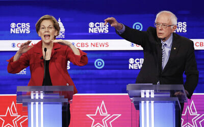 Democratic presidential candidates, Sen. Elizabeth Warren, D-Mass., left, and Sen. Bernie Sanders, I-Vt., right, participate in a Democratic presidential primary debate at the Gaillard Center on Feb. 25, 2020, in Charleston, S.C., co-hosted by CBS News and the Congressional Black Caucus Institute. (AP Photo/Patrick Semansky)