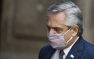 Argentina's President Alberto Fernandez in Mexico City, Tuesday, Feb. 23, 2021, amid the COVID-19 pandemic (AP Photo/Marco Ugarte)