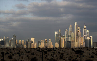 Illustrative: The sunrise reflects on city skylines at the Marina and Jumeirah Lake Towers districts in Dubai, United Arab Emirates, Feb. 27, 2021. (AP Photo/Kamran Jebreili)