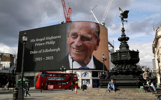 A tribute to Britain's Prince Philip is projected onto a large screen at Piccadilly Circus in London, Friday, April 9, 2021 (AP Photo/Matt Dunham) A tribute to Britain's Prince Philip is projected onto a large screen at Piccadilly Circus in London, Friday, April 9, 2021 (AP Photo/Matt Dunham)