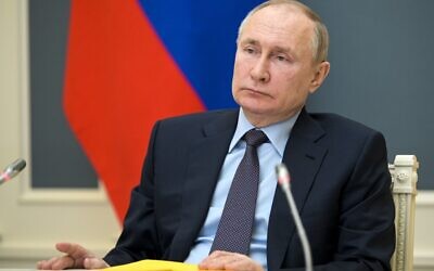 Russian President Vladimir Putin attends a session of the Russian Geographical Society via video link in Moscow, Russia, Wednesday, April 14, 2021 (Alexei Druzhinin, Sputnik, Kremlin Pool Photo via AP)