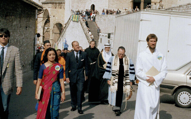 Prince Philip, the Duke of Edinburgh, president of the World Wildlife Fund, center, leads a procession with representatives of various religions from the convent to St. Francis's Basilica during an interfaith ceremony marking the end of the WWF 25th Anniversary Conference in Assisi, Italy, Sept. 29, 1986. (Giulio Broglio/AP) Prince Philip, the Duke of Edinburgh, president of the World Wildlife Fund, center, leads a procession with representatives of various religions from the convent to St. Francis's Basilica during an interfaith ceremony marking the end of the WWF 25th Anniversary Conference in Assisi, Italy, Sept. 29, 1986. (Giulio Broglio/AP)