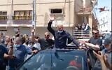 Screen capture from video of convicted terrorist Rushdi Hamdan Abu Mukh being welcome at his home town of Baqa al-Gharbiyye after his release from prison, April 5, 2021. (Twitter)