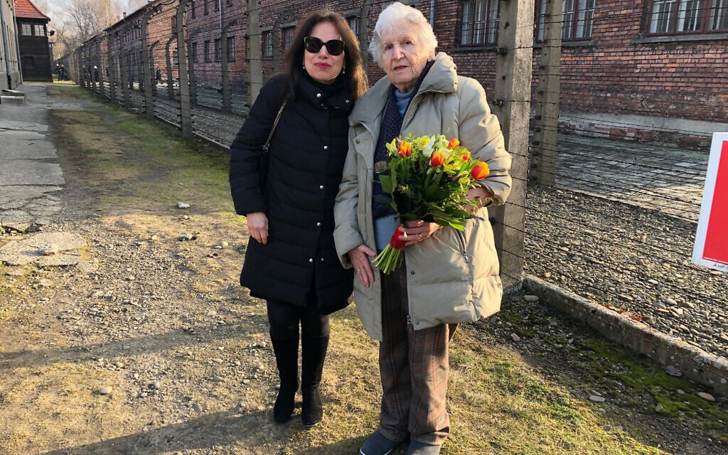 Anita Winter with Holocaust survivor Nina Weil at Auschwitz in 2020 for a ceremony commemorating the 75th liberation of the camp. (Courtesy)