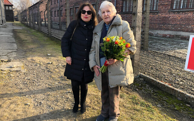 Anita Winter with Holocaust survivor Nina Weil at Auschwitz in 2020 for a ceremony commemorating the 75th liberation of the camp. (Courtesy)