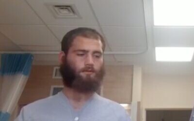 Screen capture from video of Shahar Ba'al Haness, who was injured during Lag B'Omer celebrations at Mount Meron, seen in Galilee Medical Center, April 30, 2021. (Nathan Jeffay/Times of Israel)