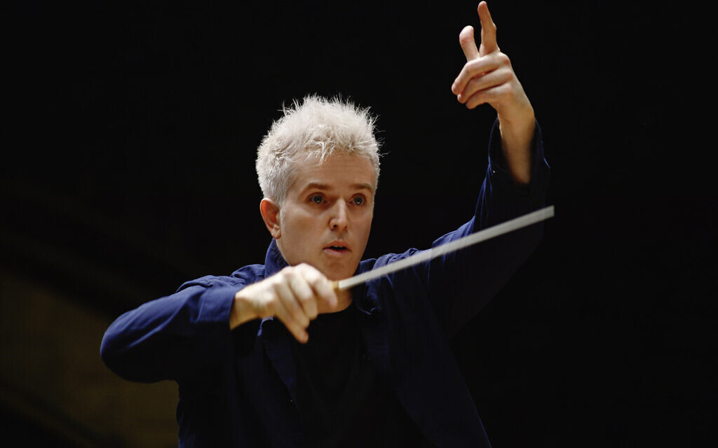 Conductor Dan Ettinger has returned to Israel after a year at his home in Mannheim, Germany, and is rehearsing 'Die Fledermaus,' opening at the New Israeli Opera on April 30, 2021 (Courtesy Dan Ettinger) Conductor Dan Ettinger has returned to Israel after a year at his home in Mannheim, Germany, and is rehearsing 'Die Fledermaus,' opening at the New Israeli Opera on April 30, 2021 (Courtesy Dan Ettinger)
