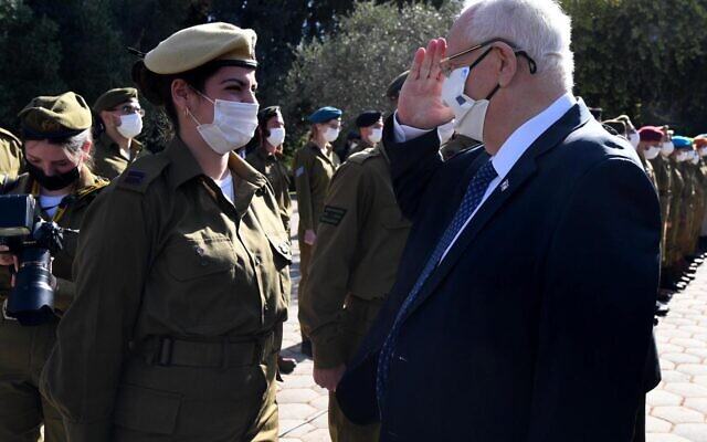 President Reuven Rivlin salutes to a soldier during an event for outstanding soldiers as part of Israel’s 73rd Independence Day celebrations, at the President’s Residence in Jerusalem on April 15, 2021. (GPO) President Reuven Rivlin salutes to a soldier during an event for outstanding soldiers as part of Israel’s 73rd Independence Day celebrations, at the President’s Residence in Jerusalem on April 15, 2021. (GPO)
