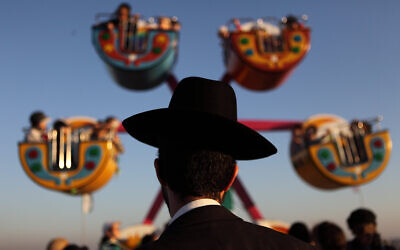 Illustrative: Ultra orthodox Jews visit an amusement park in Bnei Brak on August 08, 2012. (Yaakov Naumi/Flash90)