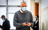 Arnon (Noni) Mozes arrives for a court hearing at Jerusalem District Court on April 5, 2021 (Oren Ben Hakoon/POOL)