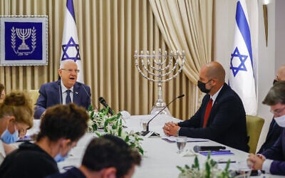 Members of the Likud party meet with President Reuven Rivlin at the President's Residence in Jerusalem on April 5, 2021, as Rivlin began consulting political leaders to decide who to task with trying to form a new government (Yonatan Sindel/Flash90)