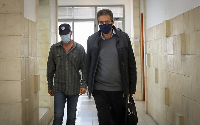 Ilan Yeshua arrives at the Jerusalem District Court in Jerusalem for a hearing in the trial of Prime Minister Benjamin Netanyahu, April 6, 2021. (Yonatan Sindel/FLASH90) Ilan Yeshua arrives at the Jerusalem District Court in Jerusalem for a hearing in the trial of Prime Minister Benjamin Netanyahu, April 6, 2021. (Yonatan Sindel/FLASH90)