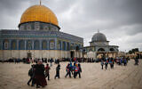 Illustrative: Palestinians visit the Al-Aqsa Mosque compound in the Old City of Jerusalem, ahead of the holy month of Ramadan, on April 10, 2021. (Jamal Awad/Flash90)