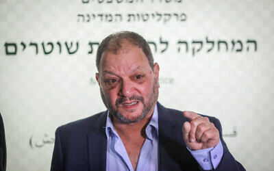 Joint List MK Ofer Cassif who was allegedly attacked by Israeli police officers during a protest, arrives to file a complaint at the Police Internal Investigations Department, in Jerusalem on April 11, 2021. (Noam Revkin Fenton/Flash90)