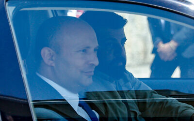 Yamina's Naftali Bennett arrives for a meeting with Prime Minister Benjamin Netanyahu at his official residence in Jerusalem, on April 13, 2021 (Yonatan Sindel/Flash90)