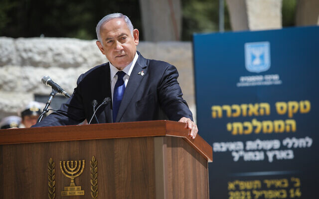 Prime Minister Benjamin Netanyahu speaks during a state memorial ceremony for victims of terror, at Mount Herzl military cemetery in Jerusalem, April 14, 2021. (Noam Revkin Fenton/Flash90)