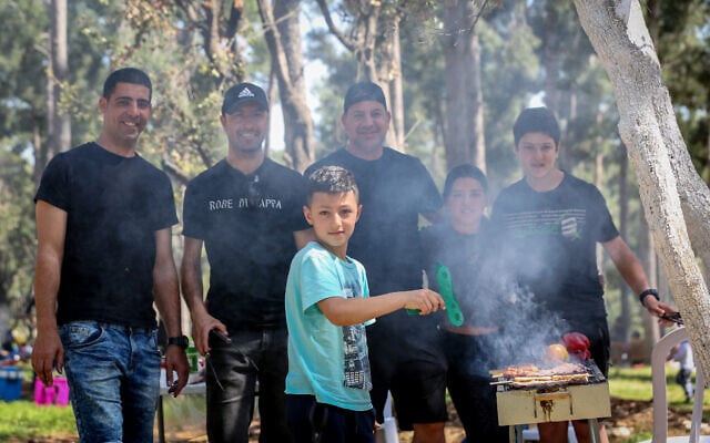 Israelis barbecue during Israel's 73d Independence Day at Dalton Park in the north, on April 15, 2021. (David Cohen/Flash90) Israelis barbecue during Israel's 73d Independence Day at Dalton Park in the north, on April 15, 2021. (David Cohen/Flash90)