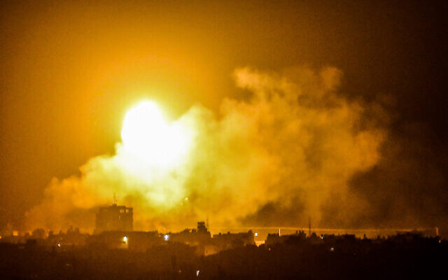 A ball of fire and smoke rises during Israeli airstrikes in Rafah, in the southern Gaza Strip on April 17, 2021. (Abed Rahim Khatib/Flash90) A ball of fire and smoke rises during Israeli airstrikes in Rafah, in the southern Gaza Strip on April 17, 2021. (Abed Rahim Khatib/Flash90)