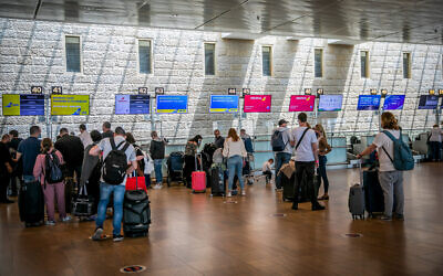 Travelers at the departures hall in Ben Gurion Airport on April 18, 2021. (Yossi Aloni/Flash90)