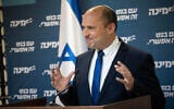 Yamina party leader Naftali Bennett speaks during a faction meeting at the Knesset, on April 26, 2021. (Yonatan Sindel/Flash90)