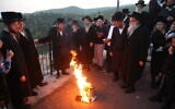 Ultra-Orthodox Jews seen during a ceremony at the Mount Meron holy site near Safed, April 27, 2021. (David Cohen/Flash90)