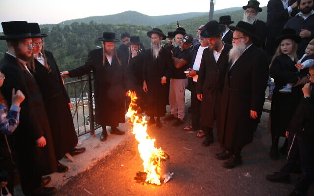 Ultra-Orthodox Jews seen during a ceremony at the Mount Meron holy site near Safed, April 27, 2021. (David Cohen/Flash90)