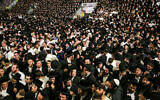 Thousands of ultra-Orthodox Jews celebrate during a Lag B'Omer gathering on Mount Meron in northern Israel on April 29, 2021 (David Cohen/Flash90)