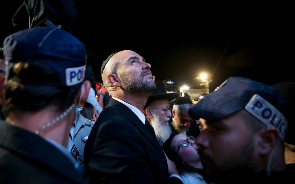 Public Security Minister Amir Ohana at the lighting of a bonfire during the celebrations of the Jewish holiday of Lag Baomer on Mt. Meron in northern Israel on April 29, 2021. (David Cohen/Flash90)