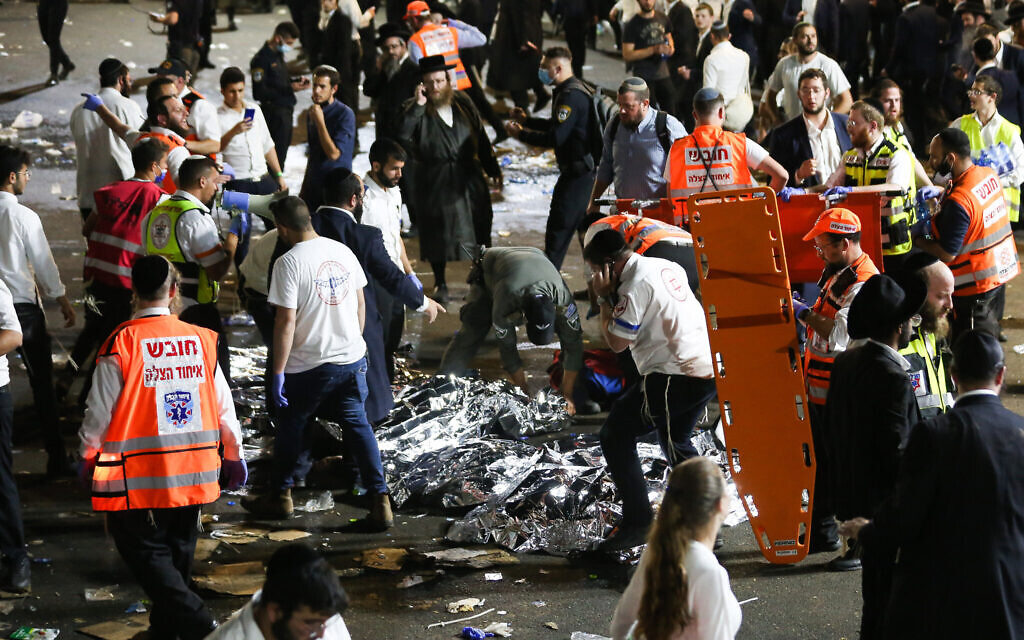Israeli rescue forces and police near a mass fatality scene during a gathering marking the Jewish holiday of Lag B'Omer on Mt. Meron, in northern Israel on April 30, 2021. (David Cohen/Flash90)