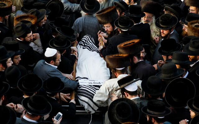 Hundreds attend the Jerusalem funeral of David Krauss in Jerusalem, one of the victims of the Meron tragedy, April 30, 2021 (Olivier Fitoussi/Flash90) Hundreds attend the Jerusalem funeral of David Krauss in Jerusalem, one of the victims of the Meron tragedy, April 30, 2021 (Olivier Fitoussi/Flash90)