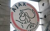 The Ajax logo seen in the team's home arena in Amsterdam. (Nicolas Economou/NurPhoto via Getty Images, via JTA)