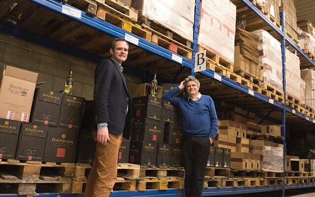 Pieter van Oordt, left, with his brother Roger at the Israel Products Center in Nijkerk, the Netherlands, February 19, 2016. (Cnaan Liphshiz via JTA) Pieter van Oordt, left, with his brother Roger at the Israel Products Center in Nijkerk, the Netherlands, February 19, 2016. (Cnaan Liphshiz via JTA)