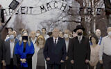 President Reuven Rivlin (center) and others take part in the virtual March of the Living ceremony, April 8, 2021. (Screen capture: YouTube)