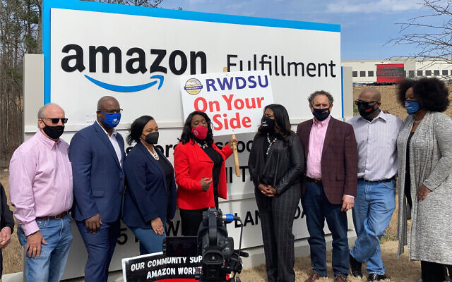 Democratic members of Congress join representatives of the Retail, Wholesale and Department Store Union gather outside an Amazon fulfillment center in Bessemer, Alabama, on March 5, 2021, to advocate for the ongoing unionization vote at the sprawling campus. The elected officials pictured include, starting second from left, Rep. Jamaal Bowman of New York, Nikema Williams of Georgia, Terri Sewell of Alabama, Cori Bush of Missouri and Andy Levin of Michigan. (AP Photo/Bill Barrow) Democratic members of Congress join representatives of the Retail, Wholesale and Department Store Union gather outside an Amazon fulfillment center in Bessemer, Alabama, on March 5, 2021, to advocate for the ongoing unionization vote at the sprawling campus. The elected officials pictured include, starting second from left, Rep. Jamaal Bowman of New York, Nikema Williams of Georgia, Terri Sewell of Alabama, Cori Bush of Missouri and Andy Levin of Michigan. (AP Photo/Bill Barrow)