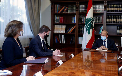 Lebanese President Michel Aoun, right, meets with US Undersecretary of State for Political Affairs David Hale, center, and, US Ambassador to Lebanon Dorothy Shea, left, at the presidential palace, in Baabda, east of Beirut, Lebanon, April 15, 2021. (Dalati Nohra/Lebanese Official Government via AP)