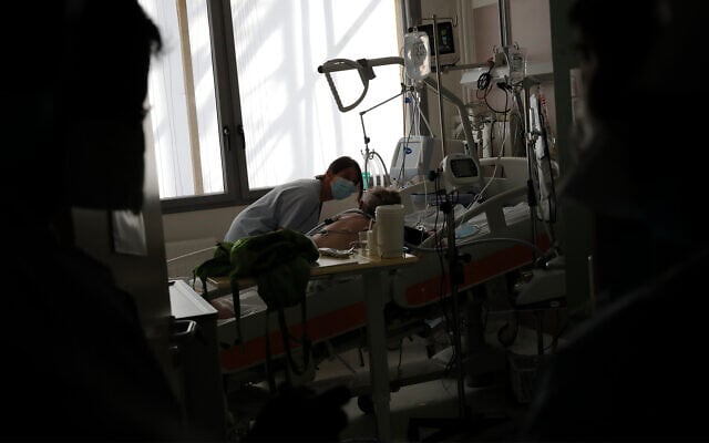 A nurse tends to a COVID-19 patient in the ICU unit at the Charles Nicolle public hospital in Normandy, France, April 15, 2021. (AP Photo/Christophe Ena) A nurse tends to a COVID-19 patient in the ICU unit at the Charles Nicolle public hospital in Normandy, France, April 15, 2021. (AP Photo/Christophe Ena)