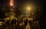 Screen capture from video said to show clashes in the Wadi al-Joz neighborhood of East Jerusalem that left a woman dead from gunfire, April 18, 2021. (Twitter)