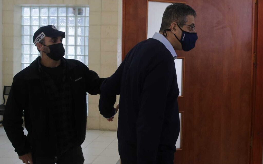 Former Walla editor Ilan Yeshua enters a courtroom at the Jerusalem District Court for a hearing in Prime Minister Benjamin Netanyahu's corruption trial, April 5, 2021. (Oren Ben Hakoon/Pool)