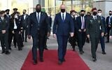 Defense Minister Benny Gantz (right) walks alongside US Defense Secretary Lloyd Austin during an honor guard ceremony at Israel's military headquarters in Tel Aviv, on April 11, 2021. (Ariel Hermoni)