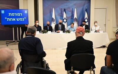 Defense Ministry officials unveil new reforms for its Rehabilitation Department at defense headquarters in Tel Aviv on April 22, 2021. (Ariel Hermoni/Defense Ministry)