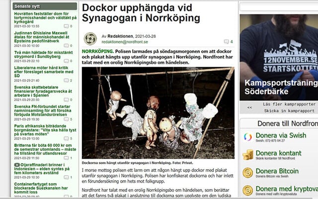 The website of the Nordic Resistance Movement features a picture of dolls hanged outside the synagogue of Norrkoping, Sweden, March 28, 2021. (NRM via JTA) The website of the Nordic Resistance Movement features a picture of dolls hanged outside the synagogue of Norrkoping, Sweden, March 28, 2021. (NRM via JTA)