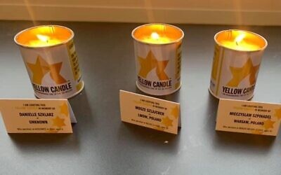 Debra Barnes's friend Karen posted a photo of the yellow candles online -- without knowing one of them (left) was in memory of Debra's aunt. (Courtesy Jewish News)