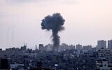 Smoke from Israeli airstrikes in the Gaza Strip, controlled by the Palestinian Hamas terror group, on May 11, 2021. (MAHMUD HAMS / AFP)