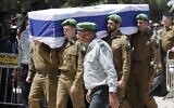 Mourners attend the funeral of Israeli soldier Omer Tabib, 21, in Elyakim in northern Israel, on May 13, 2021. Tabib was killed when Palestinian terrorists in Gaza fired an anti-tank missile near the border. (JACK GUEZ / AFP)