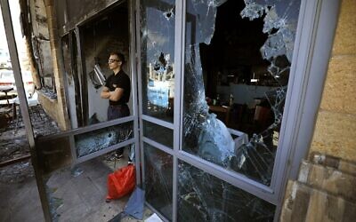 Acre's Jewish-owned Uri Buri restaurant, known for its commitment to coexistence, after it was attacked and heavily damaged in riots in the city, May 13, 2021. (JALAA MAREY / AFP)