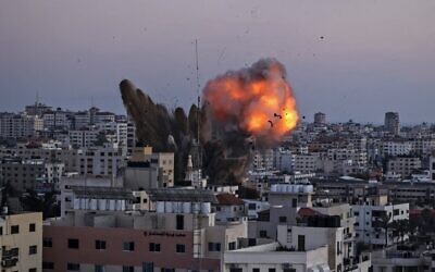 Smoke billows after an Israeli airstrike on Gaza City targeted the Ansar compound, a site linked to the Hamas terror group, on May 14, 2021. (MAHMUD HAMS / AFP)