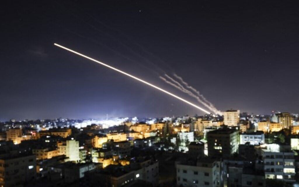 Rockets are launched from Gaza City,  towards Israel early on May 15, 2021. (Photo by MAHMUD HAMS / AFP)